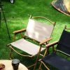 Light and durable folding table and chairs on the grass