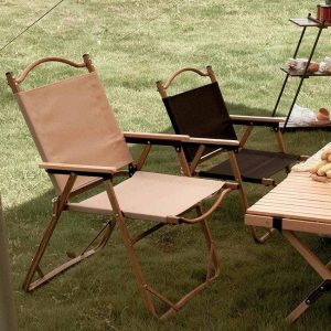 Lightweight and durable folding table and chairs on the grass